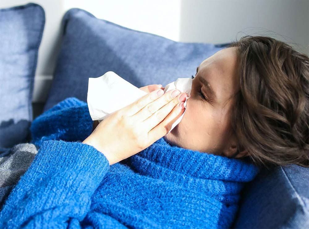 Person with cold and allergy symptoms