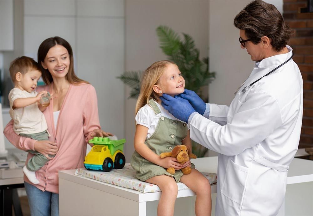 Child and parent with a doctor